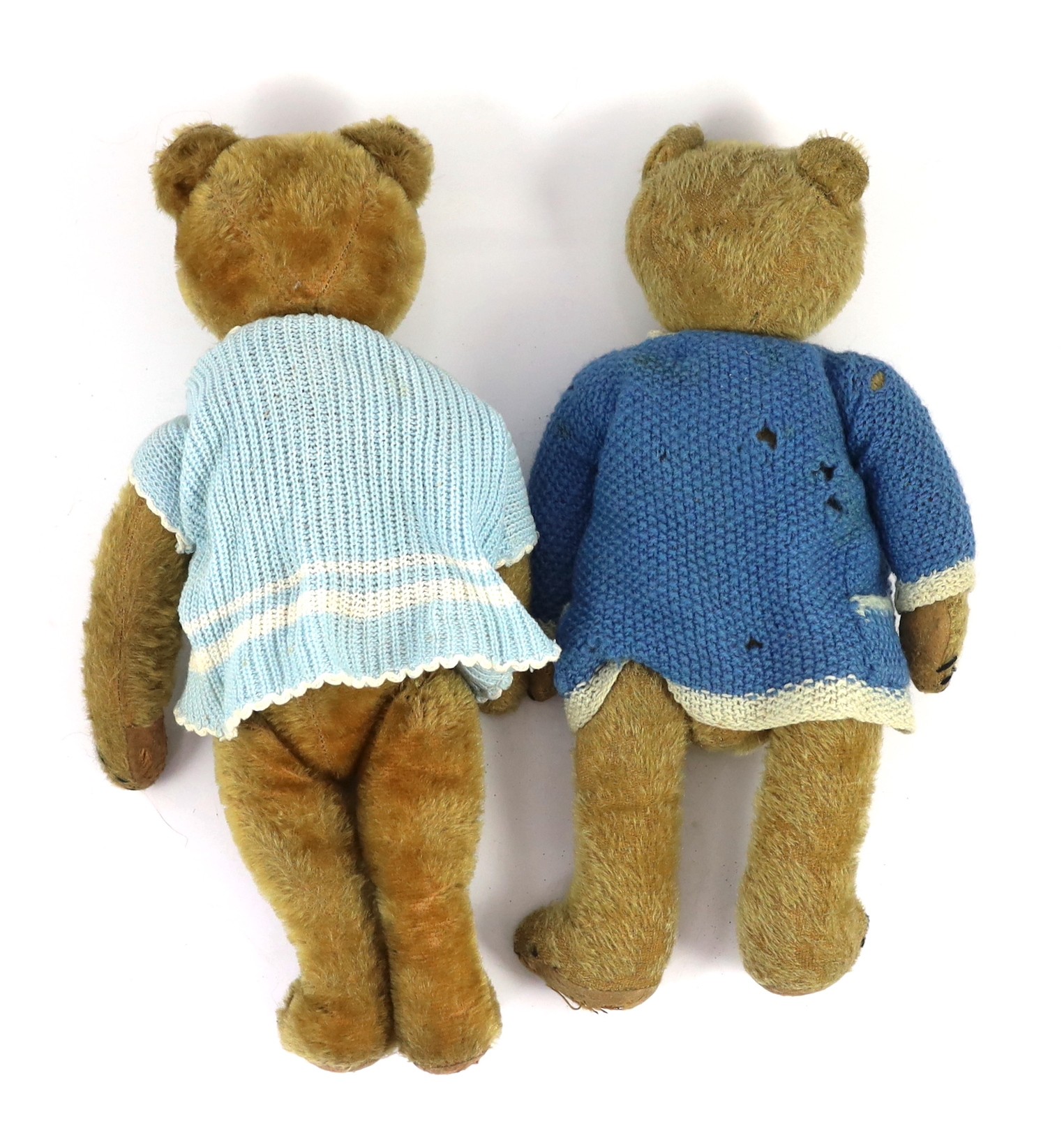 Two Gebruder Bing Teddy bears, German, circa 1920, gold mohair plush with boot-button eyes, stitched snouts and jointed limbs, both 15in.